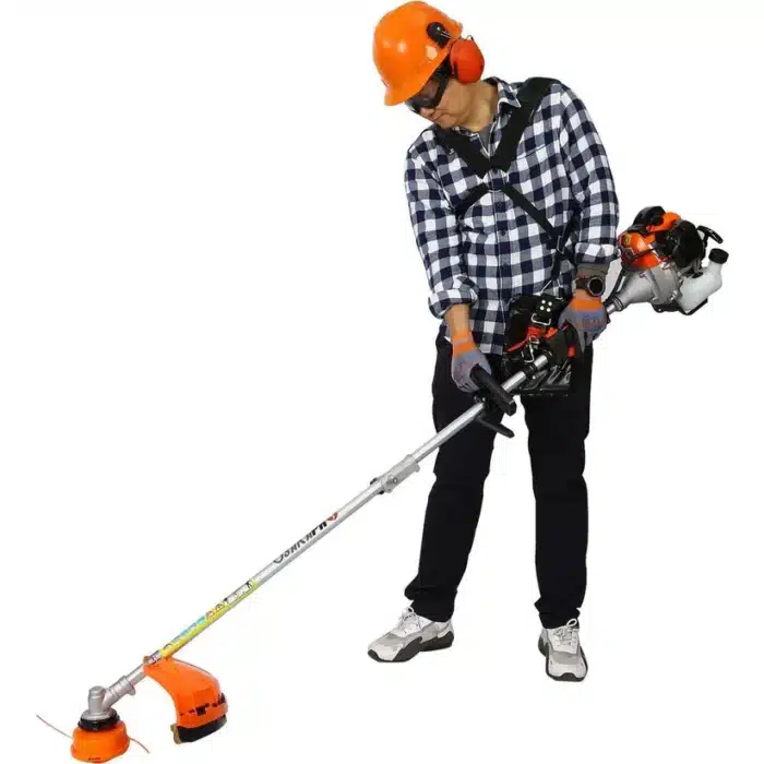 Man using 4 in 1 multi-functional trimming tool, 33CC 2-cycle garden tool system with gas pole saw - red